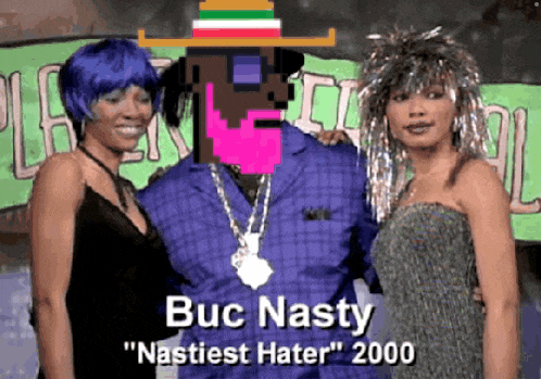 buc nasty has a hat on his head and is standing with two women