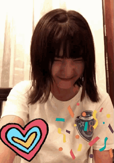 a girl wearing a white shirt that says 48 on it