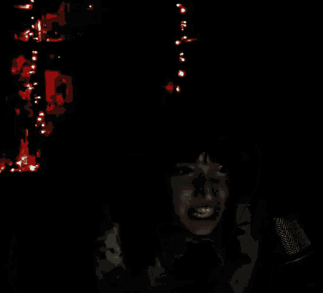 a woman with her mouth open and her tongue out