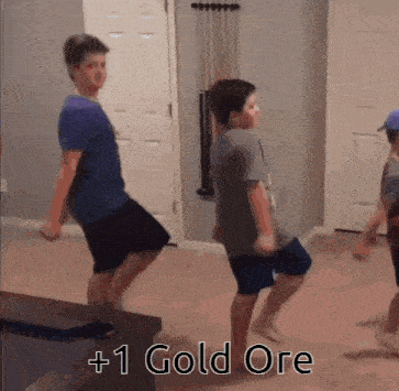 three young boys are dancing in a room with the words +1 gold ore written on the bottom