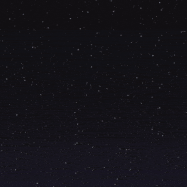 a fireworks display with yellow blue and green fireworks in the night sky
