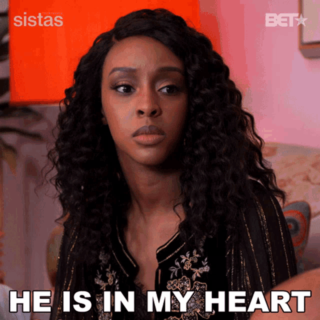 a woman says he is in my heart in a gif