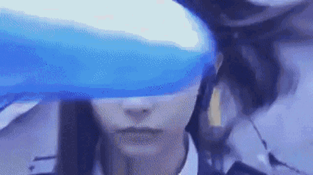 a woman wearing a virtual reality headset with a blue light coming out of her head .