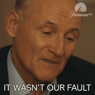 a paramount logo is behind a man 's face