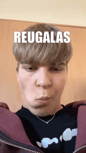 a young man making a funny face with the word reugalas above his head