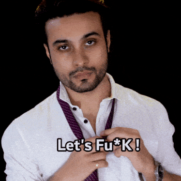 a man wearing a white shirt and a purple tie says let 's fu * k !