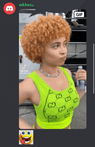 a gif of a woman with red hair is being displayed on a phone
