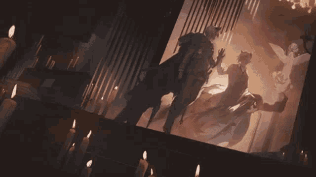 a couple of people standing next to each other in front of a painting with candles in the background .