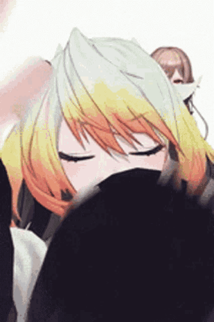 a close up of a girl with yellow hair covering her face with her eyes closed