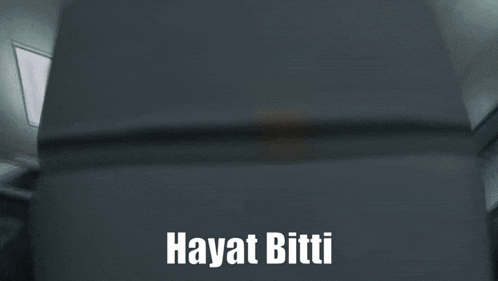 a silhouette of a person with the words hayat bitti written below it