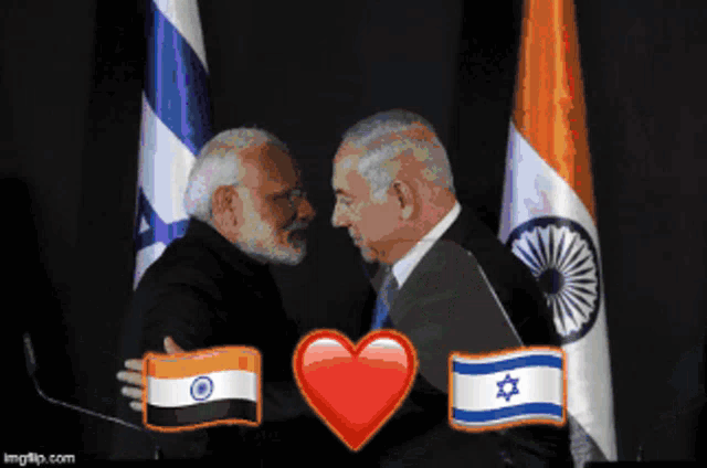 two men standing next to each other with flags in the background and a heart in the middle