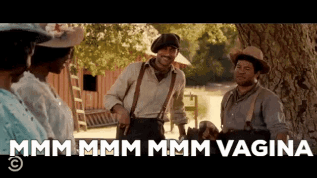 a group of men standing under a tree with the words mmmm mmmm mmmm vagina written above them