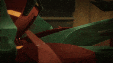 a green robot with a red helmet is looking down