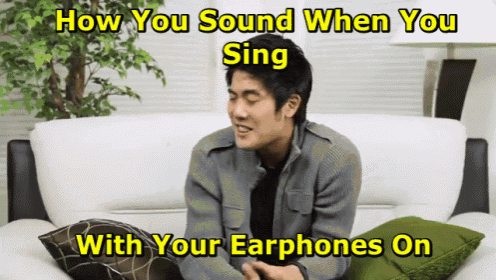 a man sitting on a couch with the words how you sound when you sing with your earphones on written above him