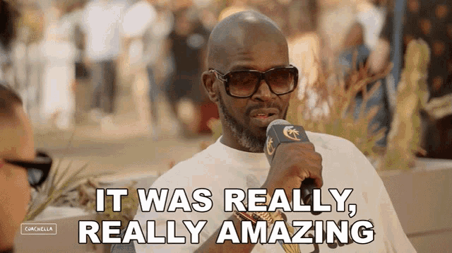 a man with a microphone says it was really amazing