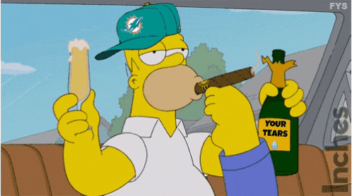 homer simpson wearing a miami dolphins hat is smoking a cigar and holding a bottle of your tears