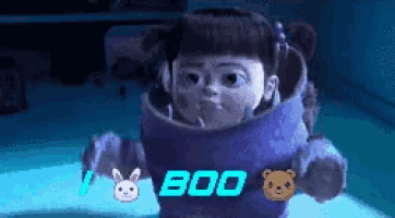 a cartoon character from the movie monsters inc is wearing a sweater that says boo