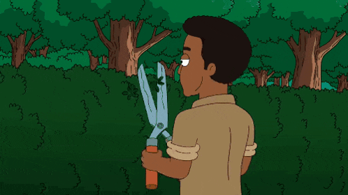 a man with a mustache is holding a pair of scissors