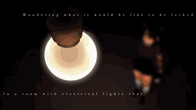 a girl is standing in front of a glowing ball with the words burn like a match below her