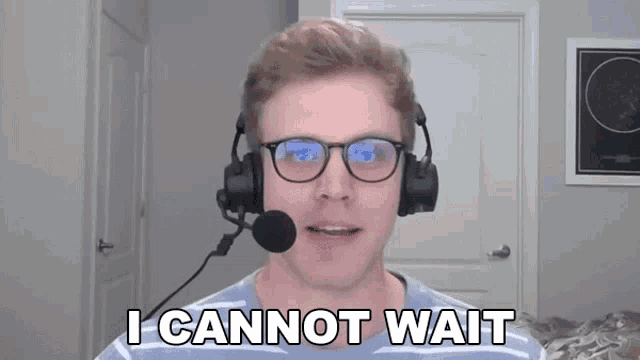a man wearing glasses and headphones with the words i cannot wait below him