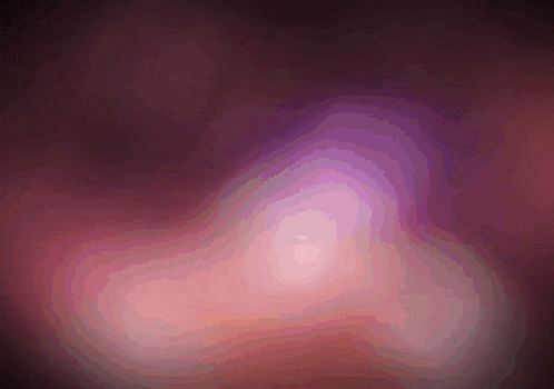 a purple and pink colored background with a swirl in the middle