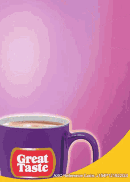 a purple mug of great taste coffee on a pink and yellow background