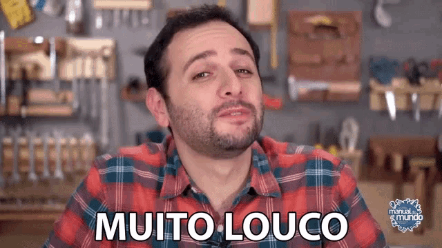 a man in a plaid shirt says muito louco in front of tools