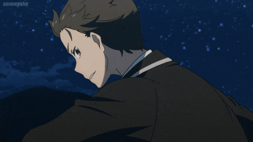 a man in a tuxedo is pointing at the camera with an animepahe logo above him