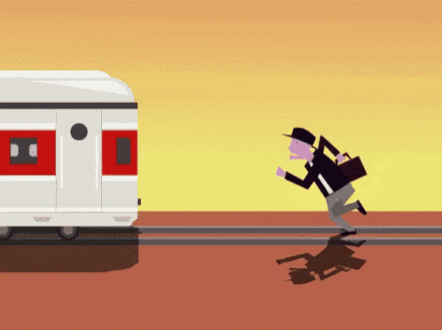 a man running towards a train with a briefcase on his back