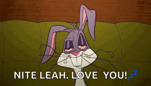 a cartoon of bugs bunny laying on a couch with the words nite leah love you