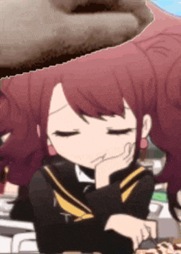a girl with red hair is sitting with her eyes closed and her hand on her chin
