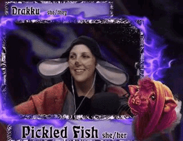 a picture of a woman in a pickled fish costume with a cat behind her