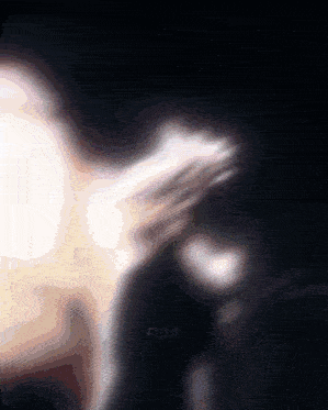 a blurry image of a person with flour written on the bottom right