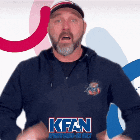 a man with a beard wearing a kfan sports radio - jiu jitsu shirt