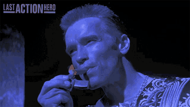 arnold schwarzenegger smoking a cigarette in a last action hero advertisement