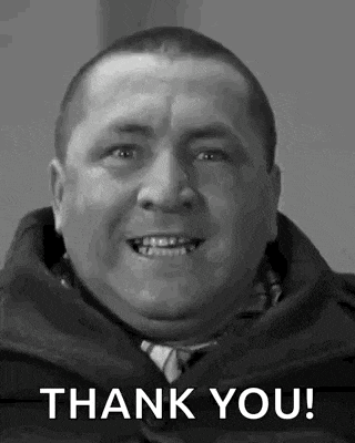 a man is smiling in a black and white photo with the words `` thank you '' .
