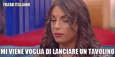 a woman is sitting on a couch with a caption that says trash italiano