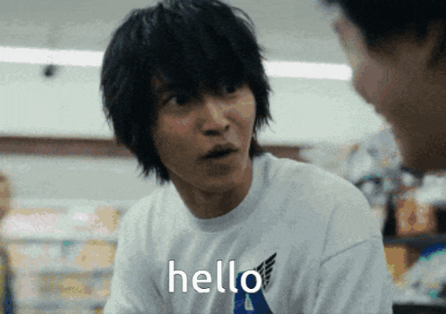 a man in a white t-shirt says hello to another man