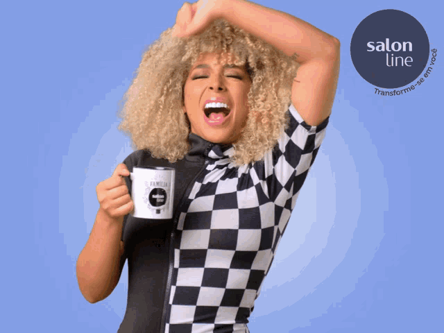 a woman in a black and white checkered top is holding a coffee mug with salon line written on it