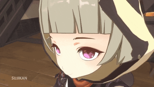 a close up of a girl 's face with the word sujikan written below it