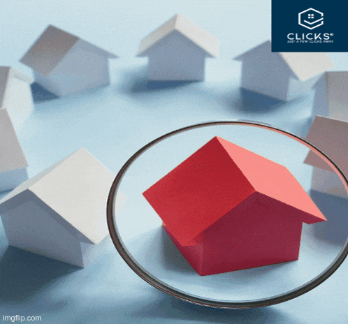 a red house is in a magnifying glass surrounded by white houses with the words clicks below it