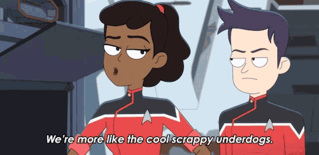 a man and a woman are standing next to each other and one of them says we 're more like the cool scrappy underdogs