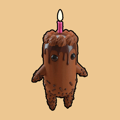 a chocolate cake with a pink candle on it