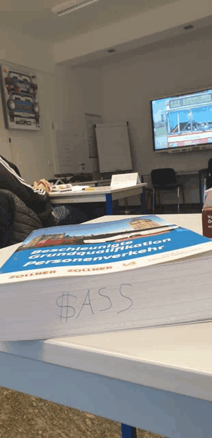 a stack of books with the word bass written on the top