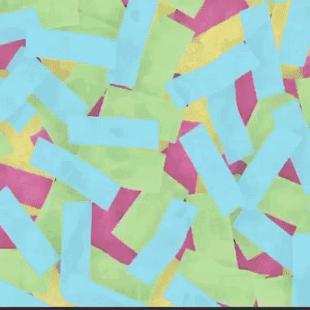 a man is playing a guitar in front of a bunch of colorful sticky notes .