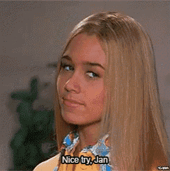 a blonde woman is saying nice try jan .