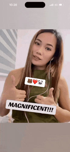 a woman giving a thumbs up with a sign that says magnificent !!!