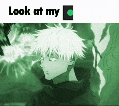 a man with white hair is standing in front of a green background and a green light .