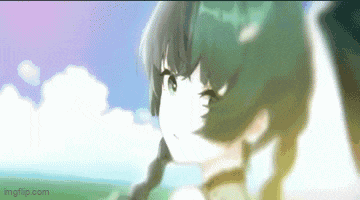 a girl with pigtails is standing in a field with a blue sky behind her .