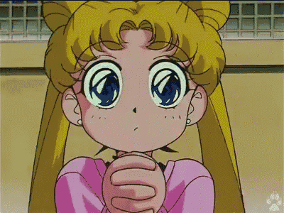 a close up of a cartoon girl with a big blue eye